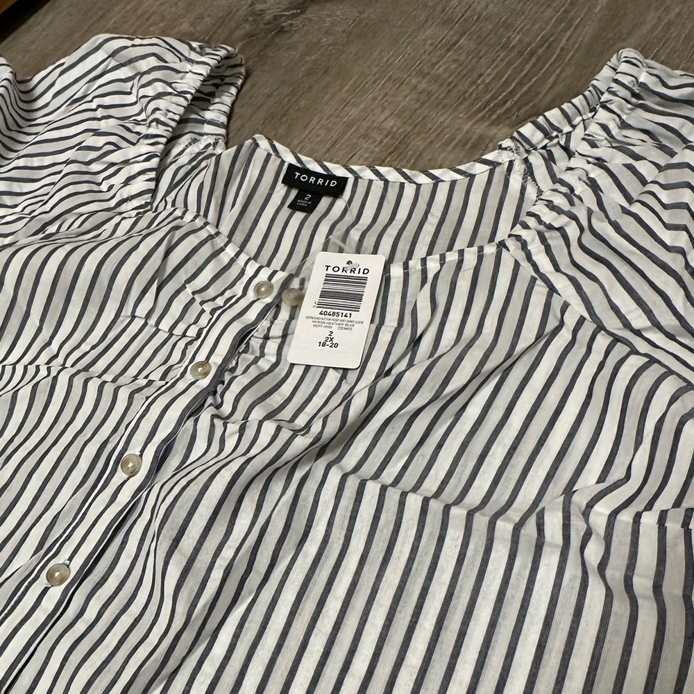Women’s short sleeve, striped shirt, blue, and white